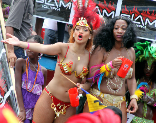 Rihanna returns to her hometown to take part in a Kadooment Day parade which was held in Barbados on August 1, 2011

Rihanna: Super Sexy for Kadooment Day Parade!

Rihanna wears a barely there bikini for a Kadooment Day parade held on Monday (August 1) in Barbados.

The 23-year-old singer arrived back in her hometown over the weekend after wrapping up the North American leg of her Loud tour.

FYI: Kadooment Day is the final day of the Crop Over traditional festival, which historically celebrated the end of the sugar cane harvest. Thousands of Barbadians join different bands with members dressed in elaborate costumes!