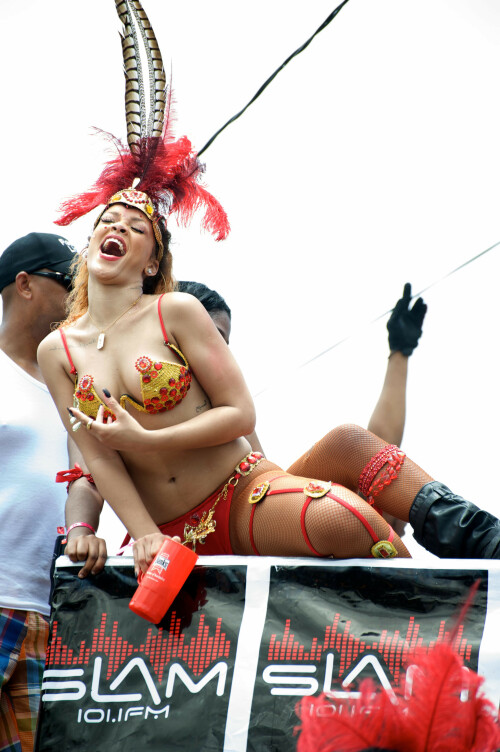 Rihanna returns to her hometown to take part in a Kadooment Day parade which was held in Barbados on August 1, 2011

Rihanna: Super Sexy for Kadooment Day Parade!

Rihanna wears a barely there bikini for a Kadooment Day parade held on Monday (August 1) in Barbados.

The 23-year-old singer arrived back in her hometown over the weekend after wrapping up the North American leg of her Loud tour.

FYI: Kadooment Day is the final day of the Crop Over traditional festival, which historically celebrated the end of the sugar cane harvest. Thousands of Barbadians join different bands with members dressed in elaborate costumes!