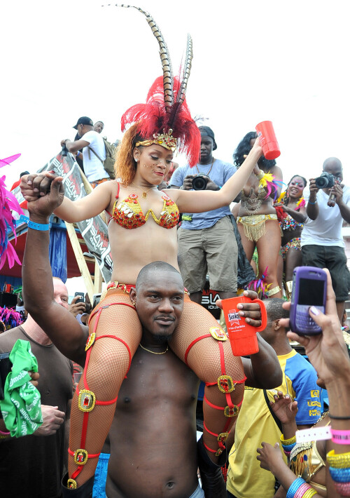 Rihanna returns to her hometown to take part in a Kadooment Day parade which was held in Barbados on August 1, 2011

Rihanna: Super Sexy for Kadooment Day Parade!

Rihanna wears a barely there bikini for a Kadooment Day parade held on Monday (August 1) in Barbados.

The 23-year-old singer arrived back in her hometown over the weekend after wrapping up the North American leg of her Loud tour.

FYI: Kadooment Day is the final day of the Crop Over traditional festival, which historically celebrated the end of the sugar cane harvest. Thousands of Barbadians join different bands with members dressed in elaborate costumes!