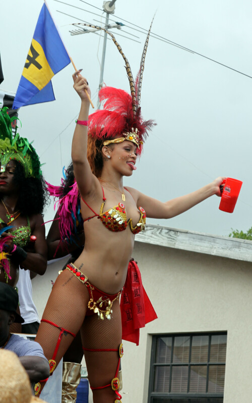 Rihanna returns to her hometown to take part in a Kadooment Day parade which was held in Barbados on August 1, 2011

Rihanna: Super Sexy for Kadooment Day Parade!

Rihanna wears a barely there bikini for a Kadooment Day parade held on Monday (August 1) in Barbados.

The 23-year-old singer arrived back in her hometown over the weekend after wrapping up the North American leg of her Loud tour.

FYI: Kadooment Day is the final day of the Crop Over traditional festival, which historically celebrated the end of the sugar cane harvest. Thousands of Barbadians join different bands with members dressed in elaborate costumes!