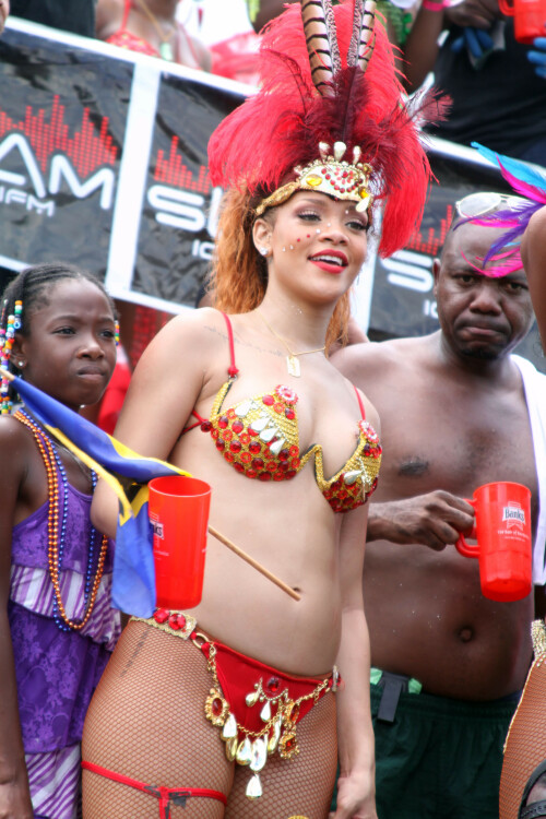 Rihanna returns to her hometown to take part in a Kadooment Day parade which was held in Barbados on August 1, 2011

Rihanna: Super Sexy for Kadooment Day Parade!

Rihanna wears a barely there bikini for a Kadooment Day parade held on Monday (August 1) in Barbados.

The 23-year-old singer arrived back in her hometown over the weekend after wrapping up the North American leg of her Loud tour.

FYI: Kadooment Day is the final day of the Crop Over traditional festival, which historically celebrated the end of the sugar cane harvest. Thousands of Barbadians join different bands with members dressed in elaborate costumes!