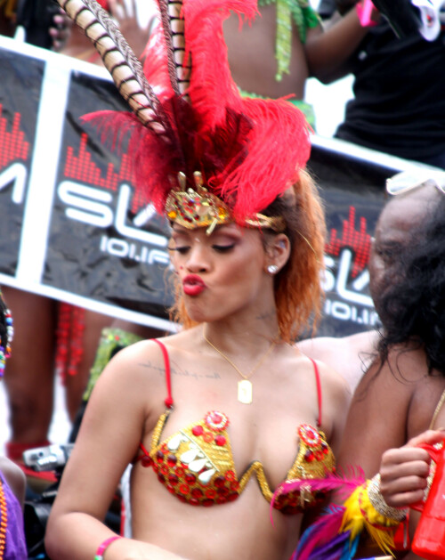 Rihanna returns to her hometown to take part in a Kadooment Day parade which was held in Barbados on August 1, 2011

Rihanna: Super Sexy for Kadooment Day Parade!

Rihanna wears a barely there bikini for a Kadooment Day parade held on Monday (August 1) in Barbados.

The 23-year-old singer arrived back in her hometown over the weekend after wrapping up the North American leg of her Loud tour.

FYI: Kadooment Day is the final day of the Crop Over traditional festival, which historically celebrated the end of the sugar cane harvest. Thousands of Barbadians join different bands with members dressed in elaborate costumes!