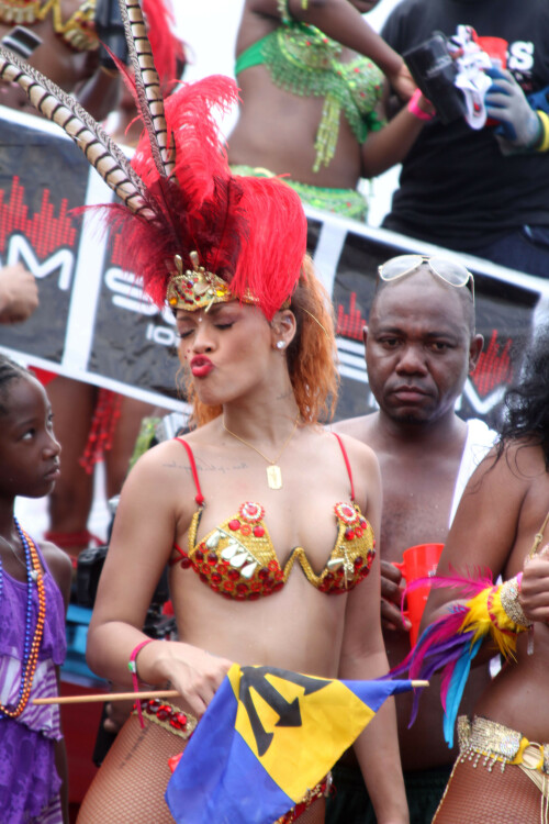 Rihanna returns to her hometown to take part in a Kadooment Day parade which was held in Barbados on August 1, 2011

Rihanna: Super Sexy for Kadooment Day Parade!

Rihanna wears a barely there bikini for a Kadooment Day parade held on Monday (August 1) in Barbados.

The 23-year-old singer arrived back in her hometown over the weekend after wrapping up the North American leg of her Loud tour.

FYI: Kadooment Day is the final day of the Crop Over traditional festival, which historically celebrated the end of the sugar cane harvest. Thousands of Barbadians join different bands with members dressed in elaborate costumes!