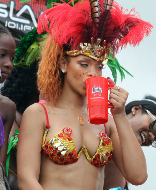 Rihanna returns to her hometown to take part in a Kadooment Day parade which was held in Barbados on August 1, 2011

Rihanna: Super Sexy for Kadooment Day Parade!

Rihanna wears a barely there bikini for a Kadooment Day parade held on Monday (August 1) in Barbados.

The 23-year-old singer arrived back in her hometown over the weekend after wrapping up the North American leg of her Loud tour.

FYI: Kadooment Day is the final day of the Crop Over traditional festival, which historically celebrated the end of the sugar cane harvest. Thousands of Barbadians join different bands with members dressed in elaborate costumes!