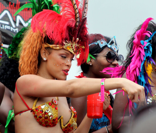 Rihanna returns to her hometown to take part in a Kadooment Day parade which was held in Barbados on August 1, 2011

Rihanna: Super Sexy for Kadooment Day Parade!

Rihanna wears a barely there bikini for a Kadooment Day parade held on Monday (August 1) in Barbados.

The 23-year-old singer arrived back in her hometown over the weekend after wrapping up the North American leg of her Loud tour.

FYI: Kadooment Day is the final day of the Crop Over traditional festival, which historically celebrated the end of the sugar cane harvest. Thousands of Barbadians join different bands with members dressed in elaborate costumes!