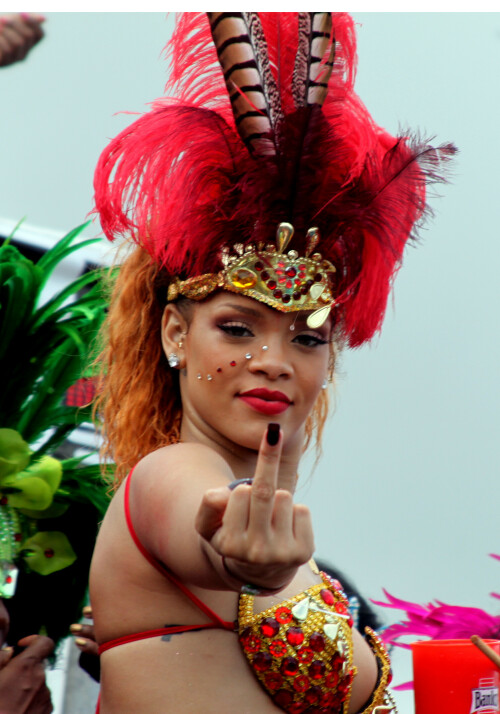 Rihanna showing middle finger

Rihanna returns to her hometown to take part in a Kadooment Day parade which was held in Barbados on August 1, 2011

Rihanna: Super Sexy for Kadooment Day Parade!

Rihanna wears a barely there bikini for a Kadooment Day parade held on Monday (August 1) in Barbados.

The 23-year-old singer arrived back in her hometown over the weekend after wrapping up the North American leg of her Loud tour.

FYI: Kadooment Day is the final day of the Crop Over traditional festival, which historically celebrated the end of the sugar cane harvest. Thousands of Barbadians join different bands with members dressed in elaborate costumes!