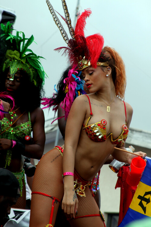 Rihanna returns to her hometown to take part in a Kadooment Day parade which was held in Barbados on August 1, 2011

Rihanna: Super Sexy for Kadooment Day Parade!

Rihanna wears a barely there bikini for a Kadooment Day parade held on Monday (August 1) in Barbados.

The 23-year-old singer arrived back in her hometown over the weekend after wrapping up the North American leg of her Loud tour.

FYI: Kadooment Day is the final day of the Crop Over traditional festival, which historically celebrated the end of the sugar cane harvest. Thousands of Barbadians join different bands with members dressed in elaborate costumes!