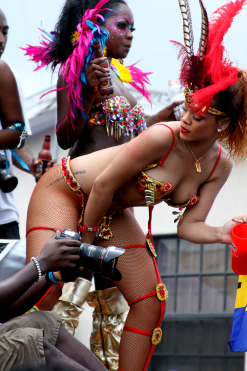 Rihanna returns to her hometown to take part in a Kadooment Day parade which was held in Barbados on August 1, 2011

Rihanna: Super Sexy for Kadooment Day Parade!

Rihanna wears a barely there bikini for a Kadooment Day parade held on Monday (August 1) in Barbados.

The 23-year-old singer arrived back in her hometown over the weekend after wrapping up the North American leg of her Loud tour.

FYI: Kadooment Day is the final day of the Crop Over traditional festival, which historically celebrated the end of the sugar cane harvest. Thousands of Barbadians join different bands with members dressed in elaborate costumes!