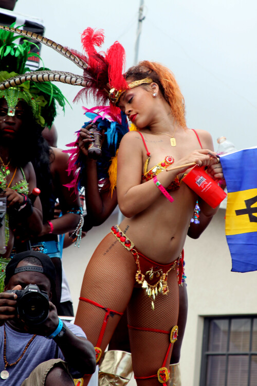 Rihanna returns to her hometown to take part in a Kadooment Day parade which was held in Barbados on August 1, 2011

Rihanna: Super Sexy for Kadooment Day Parade!

Rihanna wears a barely there bikini for a Kadooment Day parade held on Monday (August 1) in Barbados.

The 23-year-old singer arrived back in her hometown over the weekend after wrapping up the North American leg of her Loud tour.

FYI: Kadooment Day is the final day of the Crop Over traditional festival, which historically celebrated the end of the sugar cane harvest. Thousands of Barbadians join different bands with members dressed in elaborate costumes!