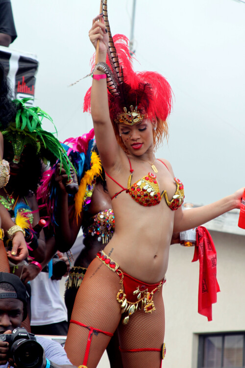 Rihanna returns to her hometown to take part in a Kadooment Day parade which was held in Barbados on August 1, 2011

Rihanna: Super Sexy for Kadooment Day Parade!

Rihanna wears a barely there bikini for a Kadooment Day parade held on Monday (August 1) in Barbados.

The 23-year-old singer arrived back in her hometown over the weekend after wrapping up the North American leg of her Loud tour.

FYI: Kadooment Day is the final day of the Crop Over traditional festival, which historically celebrated the end of the sugar cane harvest. Thousands of Barbadians join different bands with members dressed in elaborate costumes!