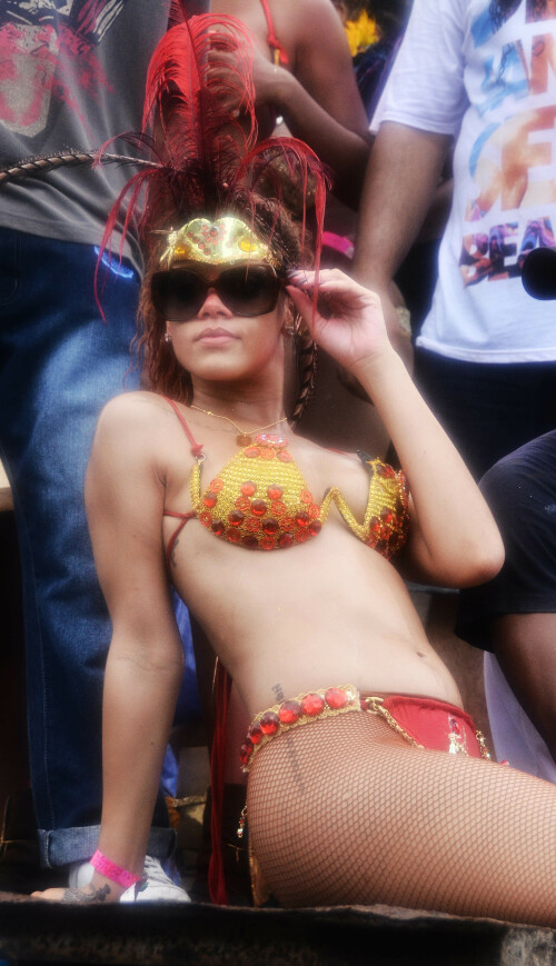 Rihanna returns to her hometown to take part in a Kadooment Day parade which was held in Barbados on August 1, 2011

Rihanna: Super Sexy for Kadooment Day Parade!

Rihanna wears a barely there bikini for a Kadooment Day parade held on Monday (August 1) in Barbados.

The 23-year-old singer arrived back in her hometown over the weekend after wrapping up the North American leg of her Loud tour.

FYI: Kadooment Day is the final day of the Crop Over traditional festival, which historically celebrated the end of the sugar cane harvest. Thousands of Barbadians join different bands with members dressed in elaborate costumes!