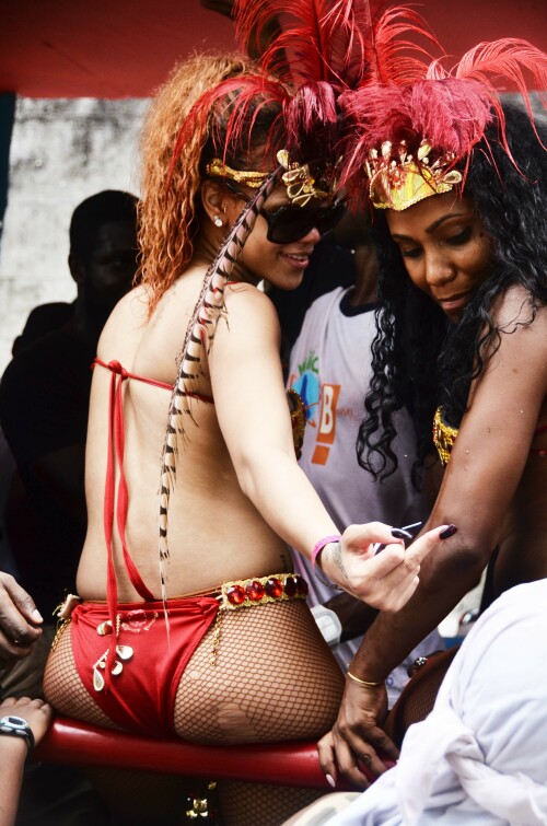 Rihanna returns to her hometown to take part in a Kadooment Day parade which was held in Barbados on August 1, 2011

Rihanna: Super Sexy for Kadooment Day Parade!

Rihanna wears a barely there bikini for a Kadooment Day parade held on Monday (August 1) in Barbados.

The 23-year-old singer arrived back in her hometown over the weekend after wrapping up the North American leg of her Loud tour.

FYI: Kadooment Day is the final day of the Crop Over traditional festival, which historically celebrated the end of the sugar cane harvest. Thousands of Barbadians join different bands with members dressed in elaborate costumes!