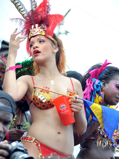 Rihanna returns to her hometown to take part in a Kadooment Day parade which was held in Barbados on August 1, 2011

Rihanna: Super Sexy for Kadooment Day Parade!

Rihanna wears a barely there bikini for a Kadooment Day parade held on Monday (August 1) in Barbados.

The 23-year-old singer arrived back in her hometown over the weekend after wrapping up the North American leg of her Loud tour.

FYI: Kadooment Day is the final day of the Crop Over traditional festival, which historically celebrated the end of the sugar cane harvest. Thousands of Barbadians join different bands with members dressed in elaborate costumes!