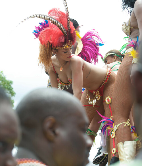 Rihanna returns to her hometown to take part in a Kadooment Day parade which was held in Barbados on August 1, 2011

Rihanna: Super Sexy for Kadooment Day Parade!

Rihanna wears a barely there bikini for a Kadooment Day parade held on Monday (August 1) in Barbados.

The 23-year-old singer arrived back in her hometown over the weekend after wrapping up the North American leg of her Loud tour.

FYI: Kadooment Day is the final day of the Crop Over traditional festival, which historically celebrated the end of the sugar cane harvest. Thousands of Barbadians join different bands with members dressed in elaborate costumes!