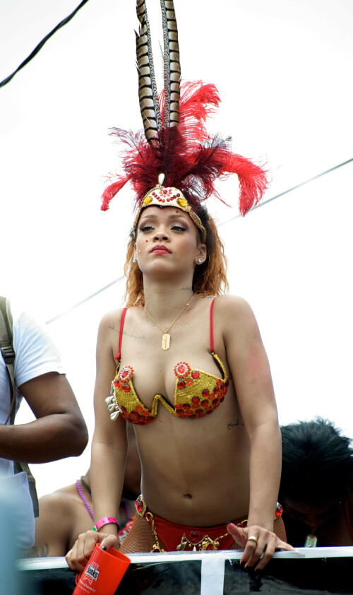 Rihanna returns to her hometown to take part in a Kadooment Day parade which was held in Barbados on August 1, 2011

Rihanna: Super Sexy for Kadooment Day Parade!

Rihanna wears a barely there bikini for a Kadooment Day parade held on Monday (August 1) in Barbados.

The 23-year-old singer arrived back in her hometown over the weekend after wrapping up the North American leg of her Loud tour.

FYI: Kadooment Day is the final day of the Crop Over traditional festival, which historically celebrated the end of the sugar cane harvest. Thousands of Barbadians join different bands with members dressed in elaborate costumes!