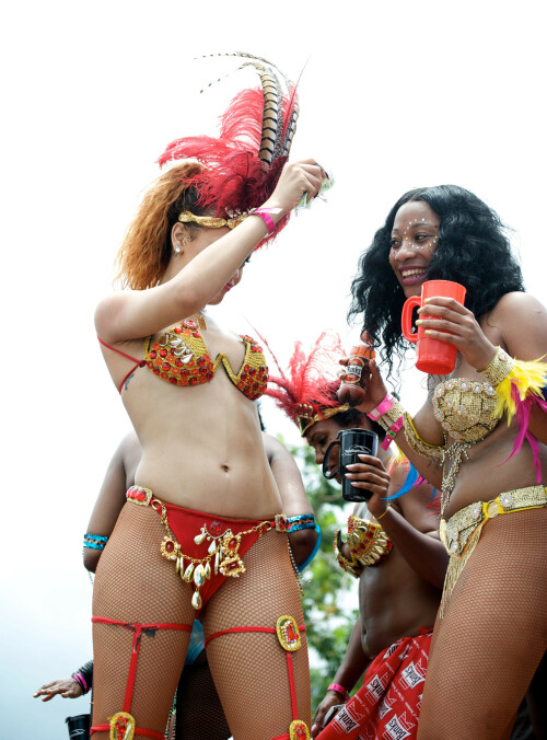 Rihanna returns to her hometown to take part in a Kadooment Day parade which was held in Barbados on August 1, 2011

Rihanna: Super Sexy for Kadooment Day Parade!

Rihanna wears a barely there bikini for a Kadooment Day parade held on Monday (August 1) in Barbados.

The 23-year-old singer arrived back in her hometown over the weekend after wrapping up the North American leg of her Loud tour.

FYI: Kadooment Day is the final day of the Crop Over traditional festival, which historically celebrated the end of the sugar cane harvest. Thousands of Barbadians join different bands with members dressed in elaborate costumes!