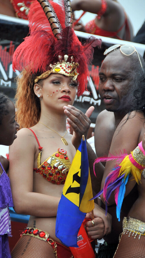 Rihanna returns to her hometown to take part in a Kadooment Day parade which was held in Barbados on August 1, 2011

Rihanna: Super Sexy for Kadooment Day Parade!

Rihanna wears a barely there bikini for a Kadooment Day parade held on Monday (August 1) in Barbados.

The 23-year-old singer arrived back in her hometown over the weekend after wrapping up the North American leg of her Loud tour.

FYI: Kadooment Day is the final day of the Crop Over traditional festival, which historically celebrated the end of the sugar cane harvest. Thousands of Barbadians join different bands with members dressed in elaborate costumes!