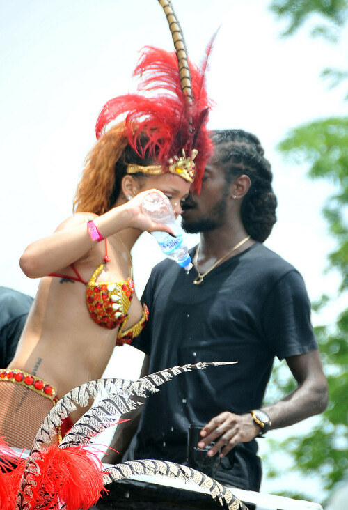 Rihanna returns to her hometown to take part in a Kadooment Day parade which was held in Barbados on August 1, 2011

Rihanna: Super Sexy for Kadooment Day Parade!

Rihanna wears a barely there bikini for a Kadooment Day parade held on Monday (August 1) in Barbados.

The 23-year-old singer arrived back in her hometown over the weekend after wrapping up the North American leg of her Loud tour.

FYI: Kadooment Day is the final day of the Crop Over traditional festival, which historically celebrated the end of the sugar cane harvest. Thousands of Barbadians join different bands with members dressed in elaborate costumes!