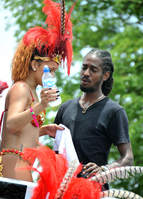 Rihanna returns to her hometown to take part in a Kadooment Day parade which was held in Barbados on August 1, 2011

Rihanna: Super Sexy for Kadooment Day Parade!

Rihanna wears a barely there bikini for a Kadooment Day parade held on Monday (August 1) in Barbados.

The 23-year-old singer arrived back in her hometown over the weekend after wrapping up the North American leg of her Loud tour.

FYI: Kadooment Day is the final day of the Crop Over traditional festival, which historically celebrated the end of the sugar cane harvest. Thousands of Barbadians join different bands with members dressed in elaborate costumes!