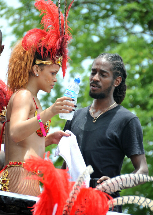 Rihanna returns to her hometown to take part in a Kadooment Day parade which was held in Barbados on August 1, 2011

Rihanna: Super Sexy for Kadooment Day Parade!

Rihanna wears a barely there bikini for a Kadooment Day parade held on Monday (August 1) in Barbados.

The 23-year-old singer arrived back in her hometown over the weekend after wrapping up the North American leg of her Loud tour.

FYI: Kadooment Day is the final day of the Crop Over traditional festival, which historically celebrated the end of the sugar cane harvest. Thousands of Barbadians join different bands with members dressed in elaborate costumes!