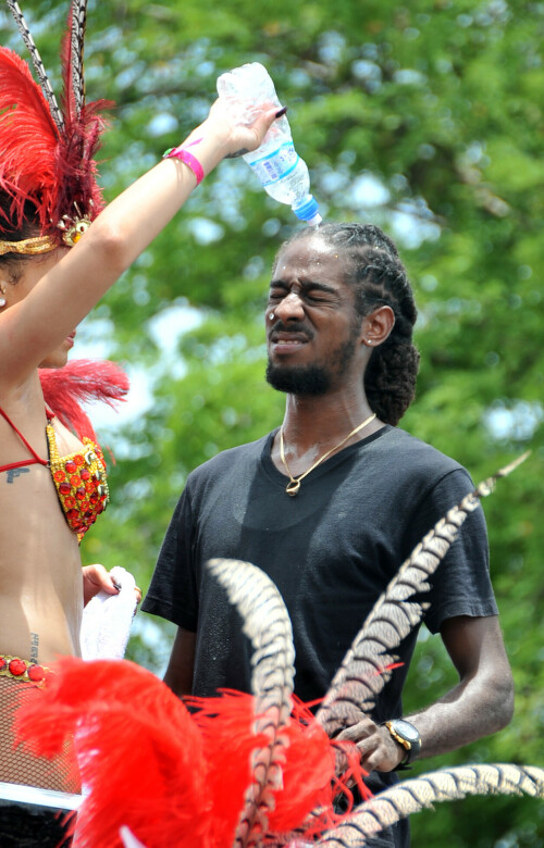 Rihanna returns to her hometown to take part in a Kadooment Day parade which was held in Barbados on August 1, 2011

Rihanna: Super Sexy for Kadooment Day Parade!

Rihanna wears a barely there bikini for a Kadooment Day parade held on Monday (August 1) in Barbados.

The 23-year-old singer arrived back in her hometown over the weekend after wrapping up the North American leg of her Loud tour.

FYI: Kadooment Day is the final day of the Crop Over traditional festival, which historically celebrated the end of the sugar cane harvest. Thousands of Barbadians join different bands with members dressed in elaborate costumes!