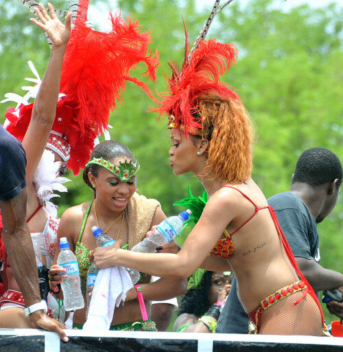 Rihanna returns to her hometown to take part in a Kadooment Day parade which was held in Barbados on August 1, 2011

Rihanna: Super Sexy for Kadooment Day Parade!

Rihanna wears a barely there bikini for a Kadooment Day parade held on Monday (August 1) in Barbados.

The 23-year-old singer arrived back in her hometown over the weekend after wrapping up the North American leg of her Loud tour.

FYI: Kadooment Day is the final day of the Crop Over traditional festival, which historically celebrated the end of the sugar cane harvest. Thousands of Barbadians join different bands with members dressed in elaborate costumes!