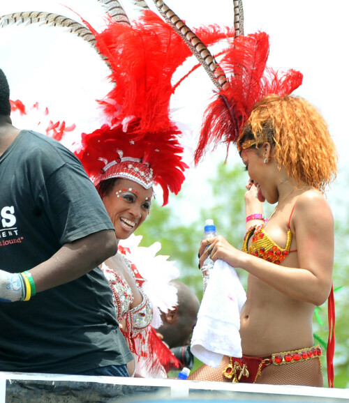 Rihanna returns to her hometown to take part in a Kadooment Day parade which was held in Barbados on August 1, 2011

Rihanna: Super Sexy for Kadooment Day Parade!

Rihanna wears a barely there bikini for a Kadooment Day parade held on Monday (August 1) in Barbados.

The 23-year-old singer arrived back in her hometown over the weekend after wrapping up the North American leg of her Loud tour.

FYI: Kadooment Day is the final day of the Crop Over traditional festival, which historically celebrated the end of the sugar cane harvest. Thousands of Barbadians join different bands with members dressed in elaborate costumes!