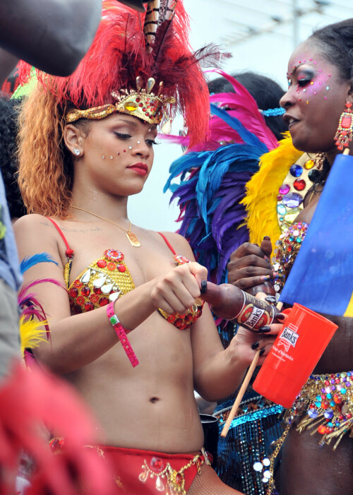 Rihanna returns to her hometown to take part in a Kadooment Day parade which was held in Barbados on August 1, 2011

Rihanna: Super Sexy for Kadooment Day Parade!

Rihanna wears a barely there bikini for a Kadooment Day parade held on Monday (August 1) in Barbados.

The 23-year-old singer arrived back in her hometown over the weekend after wrapping up the North American leg of her Loud tour.

FYI: Kadooment Day is the final day of the Crop Over traditional festival, which historically celebrated the end of the sugar cane harvest. Thousands of Barbadians join different bands with members dressed in elaborate costumes!