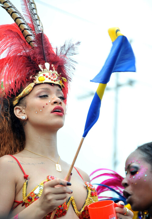 Rihanna returns to her hometown to take part in a Kadooment Day parade which was held in Barbados on August 1, 2011

Rihanna: Super Sexy for Kadooment Day Parade!

Rihanna wears a barely there bikini for a Kadooment Day parade held on Monday (August 1) in Barbados.

The 23-year-old singer arrived back in her hometown over the weekend after wrapping up the North American leg of her Loud tour.

FYI: Kadooment Day is the final day of the Crop Over traditional festival, which historically celebrated the end of the sugar cane harvest. Thousands of Barbadians join different bands with members dressed in elaborate costumes!