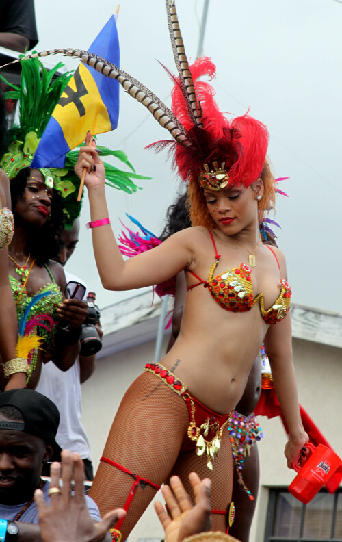 Rihanna returns to her hometown to take part in a Kadooment Day parade which was held in Barbados on August 1, 2011

Rihanna: Super Sexy for Kadooment Day Parade!

Rihanna wears a barely there bikini for a Kadooment Day parade held on Monday (August 1) in Barbados.

The 23-year-old singer arrived back in her hometown over the weekend after wrapping up the North American leg of her Loud tour.

FYI: Kadooment Day is the final day of the Crop Over traditional festival, which historically celebrated the end of the sugar cane harvest. Thousands of Barbadians join different bands with members dressed in elaborate costumes!