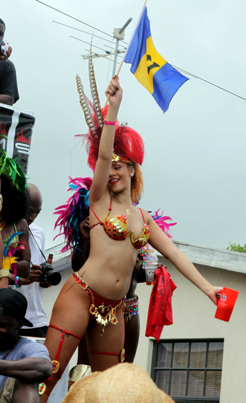 Rihanna returns to her hometown to take part in a Kadooment Day parade which was held in Barbados on August 1, 2011

Rihanna: Super Sexy for Kadooment Day Parade!

Rihanna wears a barely there bikini for a Kadooment Day parade held on Monday (August 1) in Barbados.

The 23-year-old singer arrived back in her hometown over the weekend after wrapping up the North American leg of her Loud tour.

FYI: Kadooment Day is the final day of the Crop Over traditional festival, which historically celebrated the end of the sugar cane harvest. Thousands of Barbadians join different bands with members dressed in elaborate costumes!