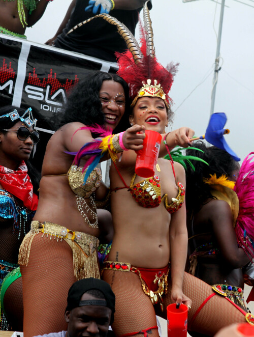 Rihanna returns to her hometown to take part in a Kadooment Day parade which was held in Barbados on August 1, 2011

Rihanna: Super Sexy for Kadooment Day Parade!

Rihanna wears a barely there bikini for a Kadooment Day parade held on Monday (August 1) in Barbados.

The 23-year-old singer arrived back in her hometown over the weekend after wrapping up the North American leg of her Loud tour.

FYI: Kadooment Day is the final day of the Crop Over traditional festival, which historically celebrated the end of the sugar cane harvest. Thousands of Barbadians join different bands with members dressed in elaborate costumes!