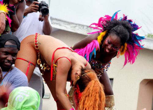 Rihanna returns to her hometown to take part in a Kadooment Day parade which was held in Barbados on August 1, 2011

Rihanna: Super Sexy for Kadooment Day Parade!

Rihanna wears a barely there bikini for a Kadooment Day parade held on Monday (August 1) in Barbados.

The 23-year-old singer arrived back in her hometown over the weekend after wrapping up the North American leg of her Loud tour.

FYI: Kadooment Day is the final day of the Crop Over traditional festival, which historically celebrated the end of the sugar cane harvest. Thousands of Barbadians join different bands with members dressed in elaborate costumes!