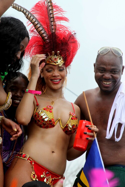 Rihanna returns to her hometown to take part in a Kadooment Day parade which was held in Barbados on August 1, 2011

Rihanna: Super Sexy for Kadooment Day Parade!

Rihanna wears a barely there bikini for a Kadooment Day parade held on Monday (August 1) in Barbados.

The 23-year-old singer arrived back in her hometown over the weekend after wrapping up the North American leg of her Loud tour.

FYI: Kadooment Day is the final day of the Crop Over traditional festival, which historically celebrated the end of the sugar cane harvest. Thousands of Barbadians join different bands with members dressed in elaborate costumes!