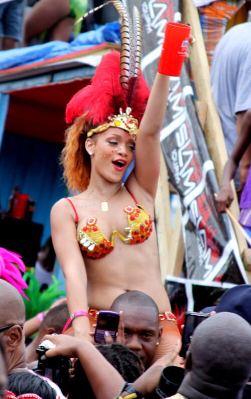 Rihanna returns to her hometown to take part in a Kadooment Day parade which was held in Barbados on August 1, 2011

Rihanna: Super Sexy for Kadooment Day Parade!

Rihanna wears a barely there bikini for a Kadooment Day parade held on Monday (August 1) in Barbados.

The 23-year-old singer arrived back in her hometown over the weekend after wrapping up the North American leg of her Loud tour.

FYI: Kadooment Day is the final day of the Crop Over traditional festival, which historically celebrated the end of the sugar cane harvest. Thousands of Barbadians join different bands with members dressed in elaborate costumes!