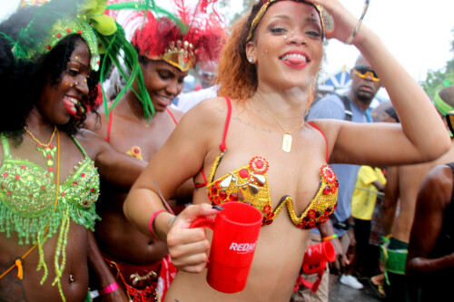 Rihanna returns to her hometown to take part in a Kadooment Day parade which was held in Barbados on August 1, 2011

Rihanna: Super Sexy for Kadooment Day Parade!

Rihanna wears a barely there bikini for a Kadooment Day parade held on Monday (August 1) in Barbados.

The 23-year-old singer arrived back in her hometown over the weekend after wrapping up the North American leg of her Loud tour.

FYI: Kadooment Day is the final day of the Crop Over traditional festival, which historically celebrated the end of the sugar cane harvest. Thousands of Barbadians join different bands with members dressed in elaborate costumes!