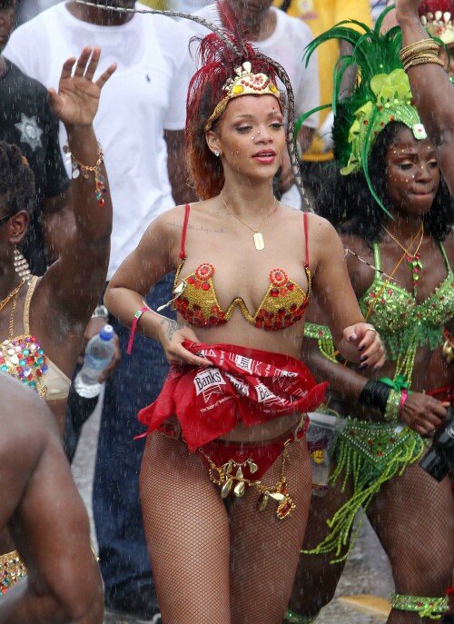 Rihanna returns to her hometown to take part in a Kadooment Day parade which was held in Barbados on August 1, 2011

Rihanna: Super Sexy for Kadooment Day Parade!

Rihanna wears a barely there bikini for a Kadooment Day parade held on Monday (August 1) in Barbados.

The 23-year-old singer arrived back in her hometown over the weekend after wrapping up the North American leg of her Loud tour.

FYI: Kadooment Day is the final day of the Crop Over traditional festival, which historically celebrated the end of the sugar cane harvest. Thousands of Barbadians join different bands with members dressed in elaborate costumes!