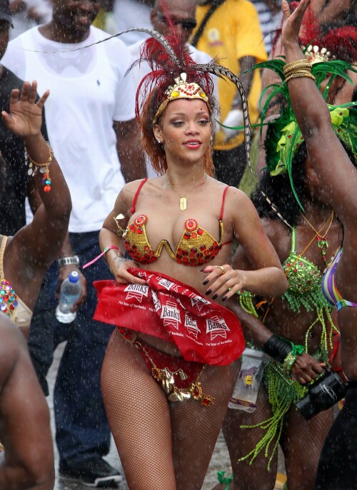 Rihanna returns to her hometown to take part in a Kadooment Day parade which was held in Barbados on August 1, 2011

Rihanna: Super Sexy for Kadooment Day Parade!

Rihanna wears a barely there bikini for a Kadooment Day parade held on Monday (August 1) in Barbados.

The 23-year-old singer arrived back in her hometown over the weekend after wrapping up the North American leg of her Loud tour.

FYI: Kadooment Day is the final day of the Crop Over traditional festival, which historically celebrated the end of the sugar cane harvest. Thousands of Barbadians join different bands with members dressed in elaborate costumes!