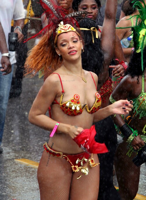 Rihanna returns to her hometown to take part in a Kadooment Day parade which was held in Barbados on August 1, 2011

Rihanna: Super Sexy for Kadooment Day Parade!

Rihanna wears a barely there bikini for a Kadooment Day parade held on Monday (August 1) in Barbados.

The 23-year-old singer arrived back in her hometown over the weekend after wrapping up the North American leg of her Loud tour.

FYI: Kadooment Day is the final day of the Crop Over traditional festival, which historically celebrated the end of the sugar cane harvest. Thousands of Barbadians join different bands with members dressed in elaborate costumes!