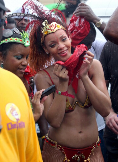 Rihanna returns to her hometown to take part in a Kadooment Day parade which was held in Barbados on August 1, 2011

Rihanna: Super Sexy for Kadooment Day Parade!

Rihanna wears a barely there bikini for a Kadooment Day parade held on Monday (August 1) in Barbados.

The 23-year-old singer arrived back in her hometown over the weekend after wrapping up the North American leg of her Loud tour.

FYI: Kadooment Day is the final day of the Crop Over traditional festival, which historically celebrated the end of the sugar cane harvest. Thousands of Barbadians join different bands with members dressed in elaborate costumes!