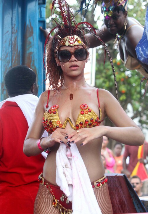 Rihanna returns to her hometown to take part in a Kadooment Day parade which was held in Barbados on August 1, 2011

Rihanna: Super Sexy for Kadooment Day Parade!

Rihanna wears a barely there bikini for a Kadooment Day parade held on Monday (August 1) in Barbados.

The 23-year-old singer arrived back in her hometown over the weekend after wrapping up the North American leg of her Loud tour.

FYI: Kadooment Day is the final day of the Crop Over traditional festival, which historically celebrated the end of the sugar cane harvest. Thousands of Barbadians join different bands with members dressed in elaborate costumes!