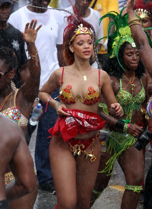 Rihanna returns to her hometown to take part in a Kadooment Day parade which was held in Barbados on August 1, 2011

Rihanna: Super Sexy for Kadooment Day Parade!

Rihanna wears a barely there bikini for a Kadooment Day parade held on Monday (August 1) in Barbados.

The 23-year-old singer arrived back in her hometown over the weekend after wrapping up the North American leg of her Loud tour.

FYI: Kadooment Day is the final day of the Crop Over traditional festival, which historically celebrated the end of the sugar cane harvest. Thousands of Barbadians join different bands with members dressed in elaborate costumes!