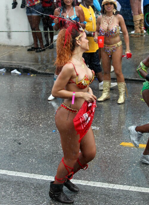 Rihanna returns to her hometown to take part in a Kadooment Day parade which was held in Barbados on August 1, 2011

Rihanna: Super Sexy for Kadooment Day Parade!

Rihanna wears a barely there bikini for a Kadooment Day parade held on Monday (August 1) in Barbados.

The 23-year-old singer arrived back in her hometown over the weekend after wrapping up the North American leg of her Loud tour.

FYI: Kadooment Day is the final day of the Crop Over traditional festival, which historically celebrated the end of the sugar cane harvest. Thousands of Barbadians join different bands with members dressed in elaborate costumes!