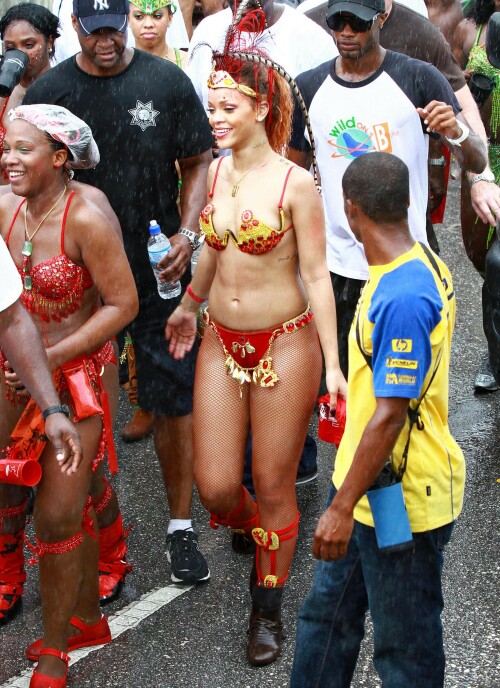 Rihanna returns to her hometown to take part in a Kadooment Day parade which was held in Barbados on August 1, 2011

Rihanna: Super Sexy for Kadooment Day Parade!

Rihanna wears a barely there bikini for a Kadooment Day parade held on Monday (August 1) in Barbados.

The 23-year-old singer arrived back in her hometown over the weekend after wrapping up the North American leg of her Loud tour.

FYI: Kadooment Day is the final day of the Crop Over traditional festival, which historically celebrated the end of the sugar cane harvest. Thousands of Barbadians join different bands with members dressed in elaborate costumes!