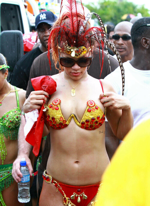 Rihanna returns to her hometown to take part in a Kadooment Day parade which was held in Barbados on August 1, 2011

Rihanna: Super Sexy for Kadooment Day Parade!

Rihanna wears a barely there bikini for a Kadooment Day parade held on Monday (August 1) in Barbados.

The 23-year-old singer arrived back in her hometown over the weekend after wrapping up the North American leg of her Loud tour.

FYI: Kadooment Day is the final day of the Crop Over traditional festival, which historically celebrated the end of the sugar cane harvest. Thousands of Barbadians join different bands with members dressed in elaborate costumes!