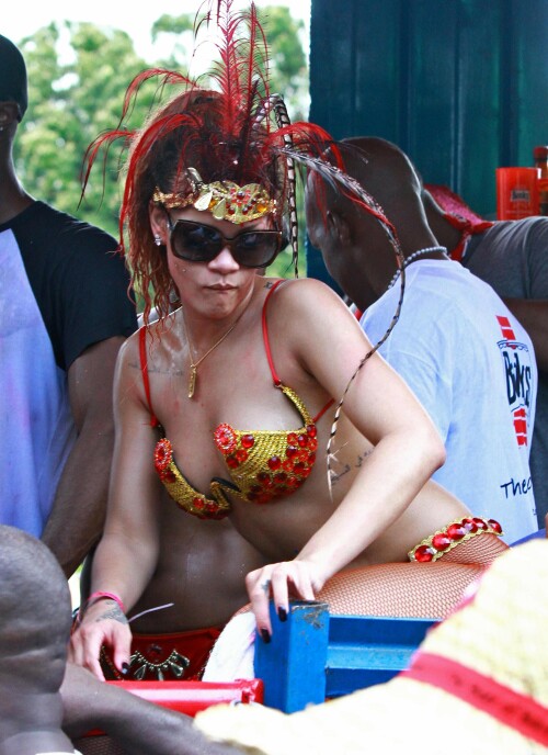 Rihanna returns to her hometown to take part in a Kadooment Day parade which was held in Barbados on August 1, 2011

Rihanna: Super Sexy for Kadooment Day Parade!

Rihanna wears a barely there bikini for a Kadooment Day parade held on Monday (August 1) in Barbados.

The 23-year-old singer arrived back in her hometown over the weekend after wrapping up the North American leg of her Loud tour.

FYI: Kadooment Day is the final day of the Crop Over traditional festival, which historically celebrated the end of the sugar cane harvest. Thousands of Barbadians join different bands with members dressed in elaborate costumes!