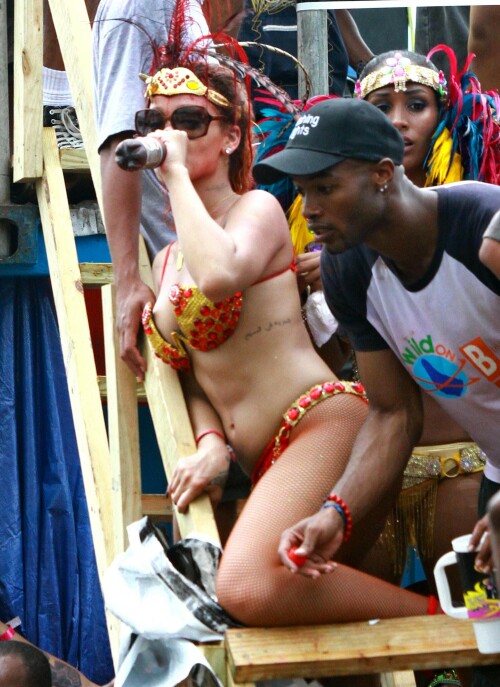 Rihanna returns to her hometown to take part in a Kadooment Day parade which was held in Barbados on August 1, 2011

Rihanna: Super Sexy for Kadooment Day Parade!

Rihanna wears a barely there bikini for a Kadooment Day parade held on Monday (August 1) in Barbados.

The 23-year-old singer arrived back in her hometown over the weekend after wrapping up the North American leg of her Loud tour.

FYI: Kadooment Day is the final day of the Crop Over traditional festival, which historically celebrated the end of the sugar cane harvest. Thousands of Barbadians join different bands with members dressed in elaborate costumes!