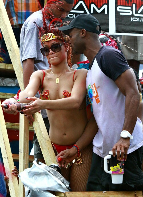 Rihanna returns to her hometown to take part in a Kadooment Day parade which was held in Barbados on August 1, 2011

Rihanna: Super Sexy for Kadooment Day Parade!

Rihanna wears a barely there bikini for a Kadooment Day parade held on Monday (August 1) in Barbados.

The 23-year-old singer arrived back in her hometown over the weekend after wrapping up the North American leg of her Loud tour.

FYI: Kadooment Day is the final day of the Crop Over traditional festival, which historically celebrated the end of the sugar cane harvest. Thousands of Barbadians join different bands with members dressed in elaborate costumes!