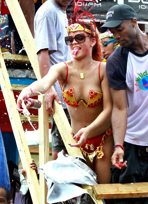 Rihanna returns to her hometown to take part in a Kadooment Day parade which was held in Barbados on August 1, 2011

Rihanna: Super Sexy for Kadooment Day Parade!

Rihanna wears a barely there bikini for a Kadooment Day parade held on Monday (August 1) in Barbados.

The 23-year-old singer arrived back in her hometown over the weekend after wrapping up the North American leg of her Loud tour.

FYI: Kadooment Day is the final day of the Crop Over traditional festival, which historically celebrated the end of the sugar cane harvest. Thousands of Barbadians join different bands with members dressed in elaborate costumes!