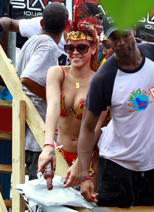 Rihanna returns to her hometown to take part in a Kadooment Day parade which was held in Barbados on August 1, 2011

Rihanna: Super Sexy for Kadooment Day Parade!

Rihanna wears a barely there bikini for a Kadooment Day parade held on Monday (August 1) in Barbados.

The 23-year-old singer arrived back in her hometown over the weekend after wrapping up the North American leg of her Loud tour.

FYI: Kadooment Day is the final day of the Crop Over traditional festival, which historically celebrated the end of the sugar cane harvest. Thousands of Barbadians join different bands with members dressed in elaborate costumes!